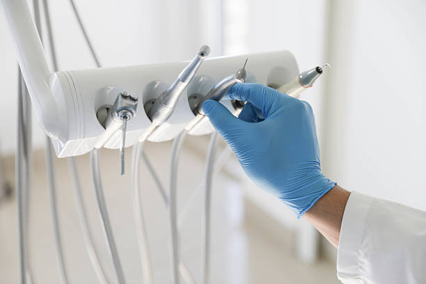 Professional Tooth Extraction technician working in Perkins, OK